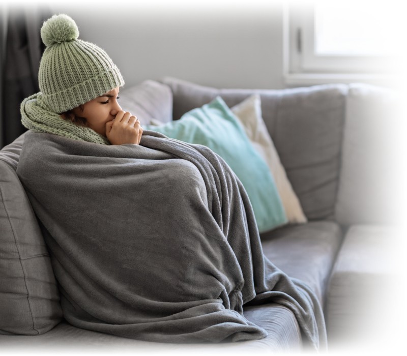 Woman Shivering on couch